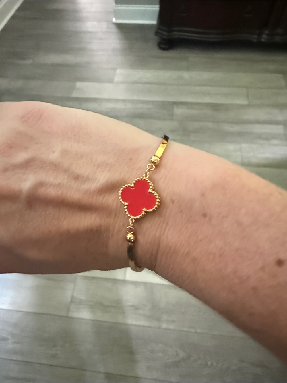 Gold-Tone Bracelet with Red Clover Charm